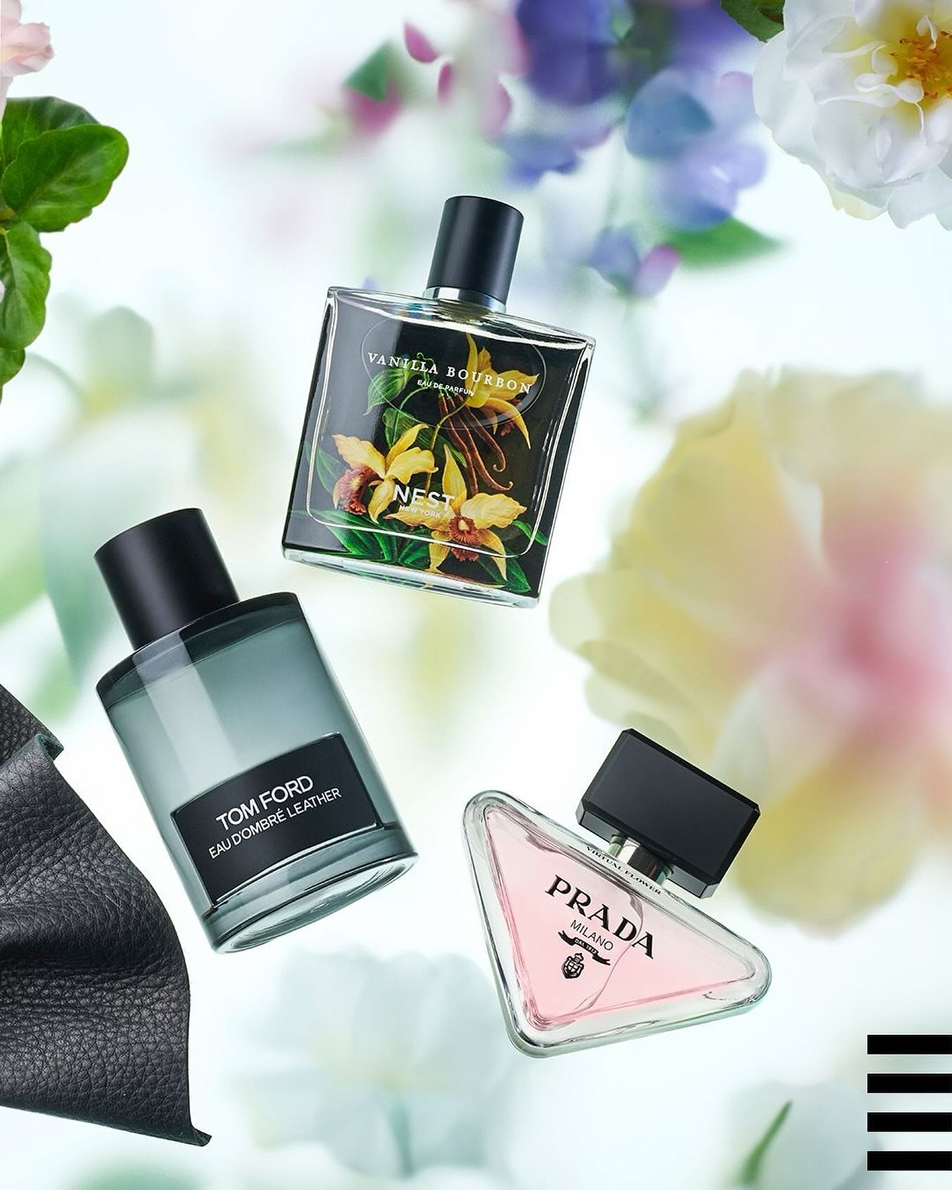 A collection of luxury perfumes, including bottles from Tom Ford, Prada, and Nest, displayed against a floral backdrop, available at Sephora.