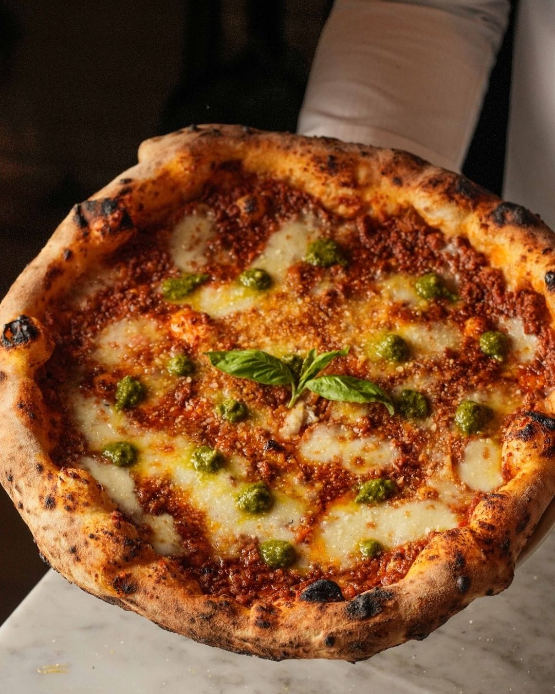 Rustic Italian pizzeria ambiance at Bellillo .