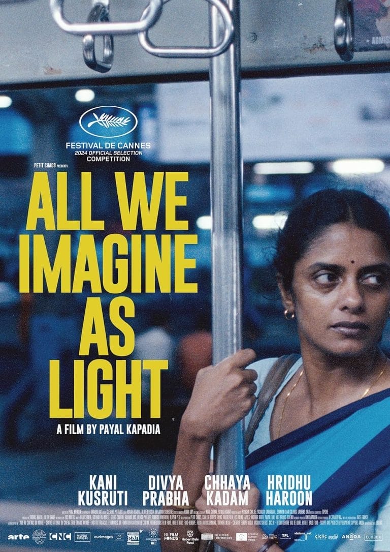 A movie poster for All We Imagine as Light, featuring a woman in traditional Indian attire holding a pole inside a bus, gazing thoughtfully into the distance. The title is boldly displayed in large yellow text, with the film credited to director Payal Kapadia. The Cannes Film Festival logo is featured at the top, indicating its official selection for the TIFF 2024 competition.