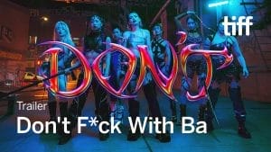 A group of fierce women stands confidently in the neon-lit streets of New York’s Chinatown, exuding strength and defiance. The bold, stylized text "Don't F*ck With Ba" overlays the image in vibrant, electric colors. Each character is dressed in edgy, punk-inspired outfits, ready for action. The TIFF logo appears in the corner, signaling the film’s feature at the festival. The scene captures the intense, rebellious energy of the film.
