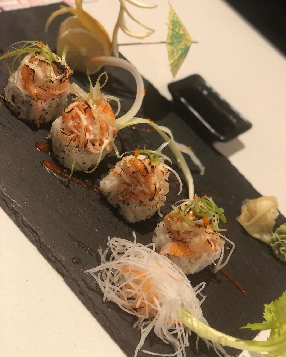 A cozy sushi spot known for its fresh ingredients, wide selection of rolls, and welcoming atmosphere.