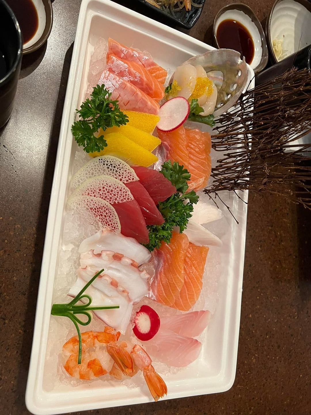 A popular spot offering fresh sushi and seafood, known for its diverse menu and inviting dining atmosphere.