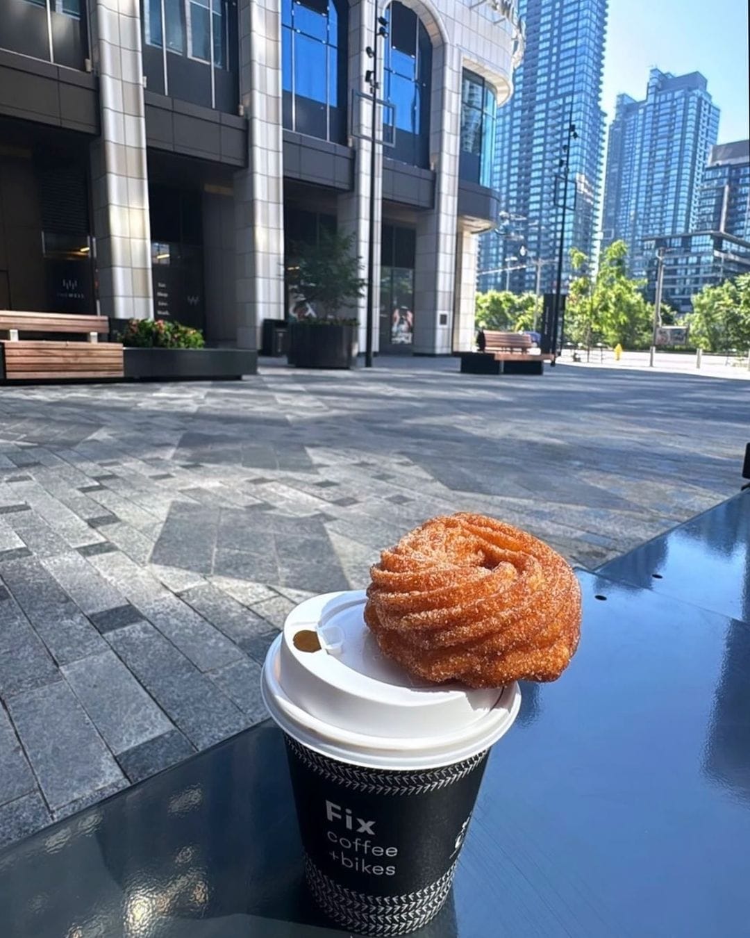 A minimalist space fusing quality coffee with bike culture, perfect for cyclists and coffee lovers.