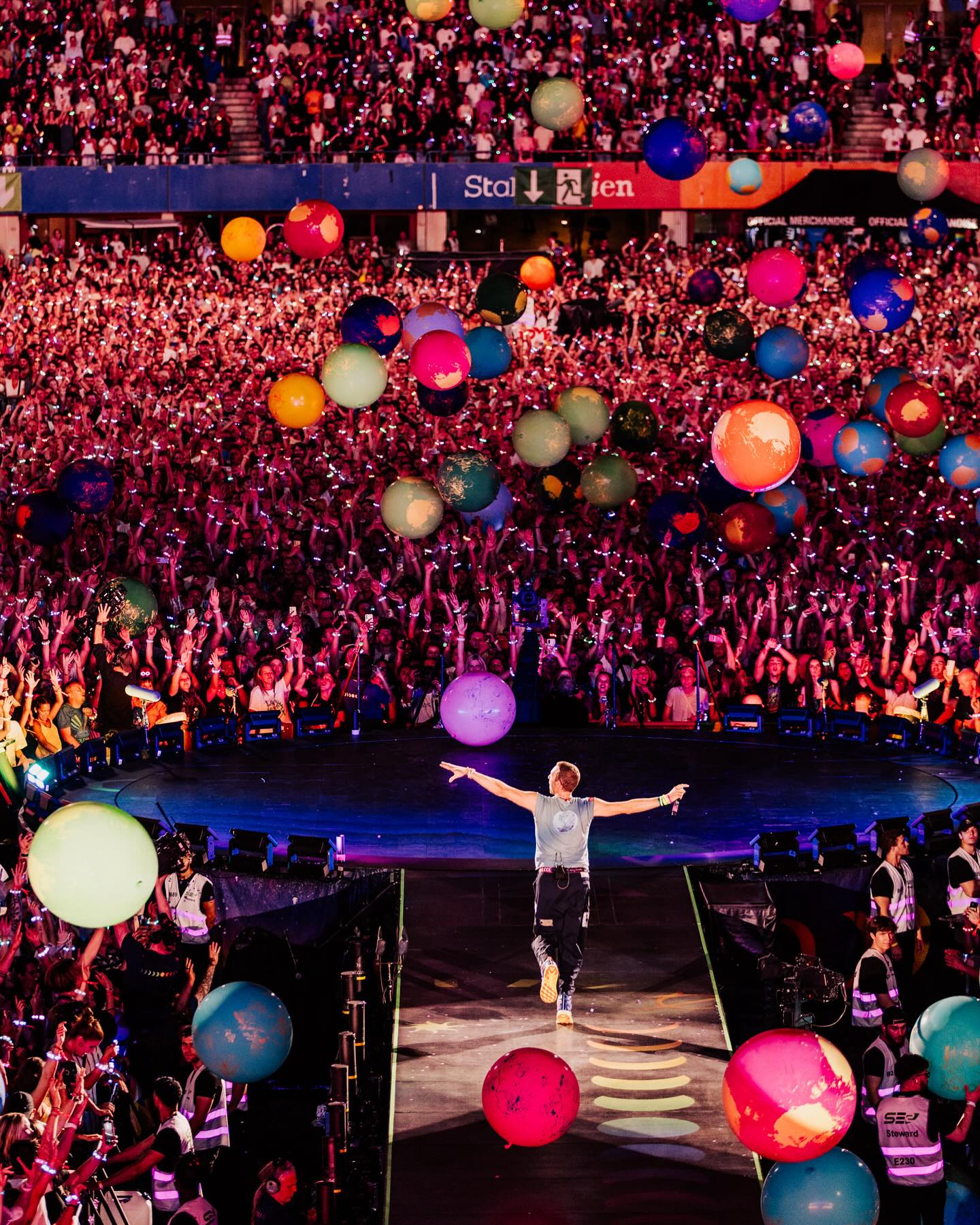 Coldplay performing live on stage during the Music Of The Spheres World Tour
