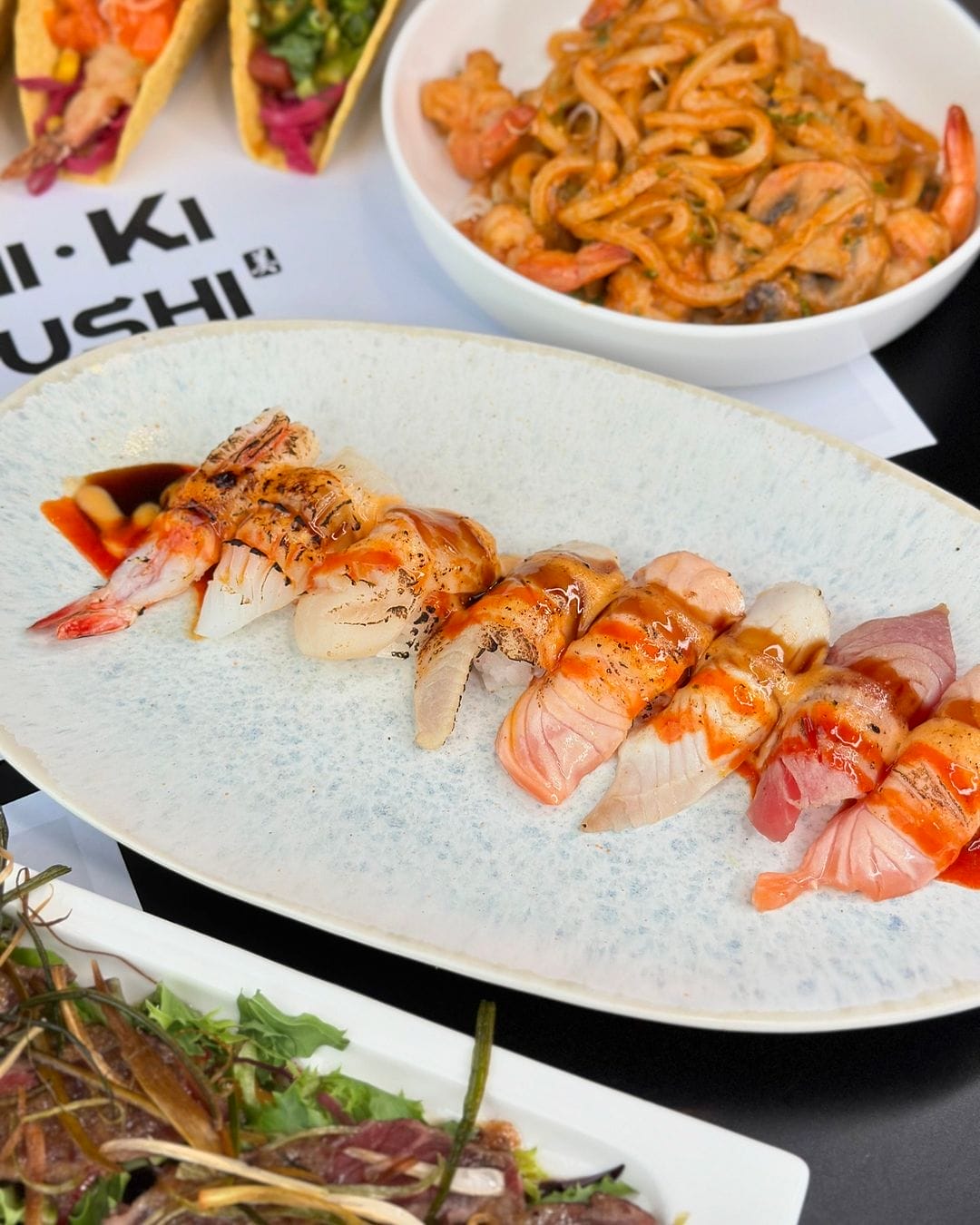 A sushi lover's go-to for exploring vibrant sushi creations and fresh seafood, featuring top dining recommendations and food experiences