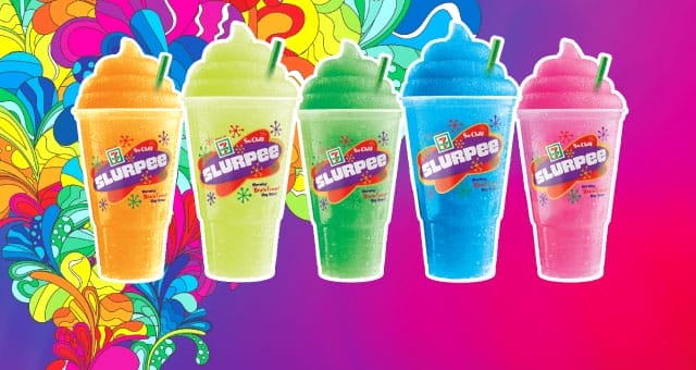 Slurpees of different colours in clear cups