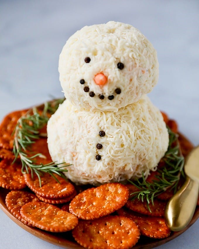 Bring the Holiday Magic to Your Table with This Snowman Cheeseball