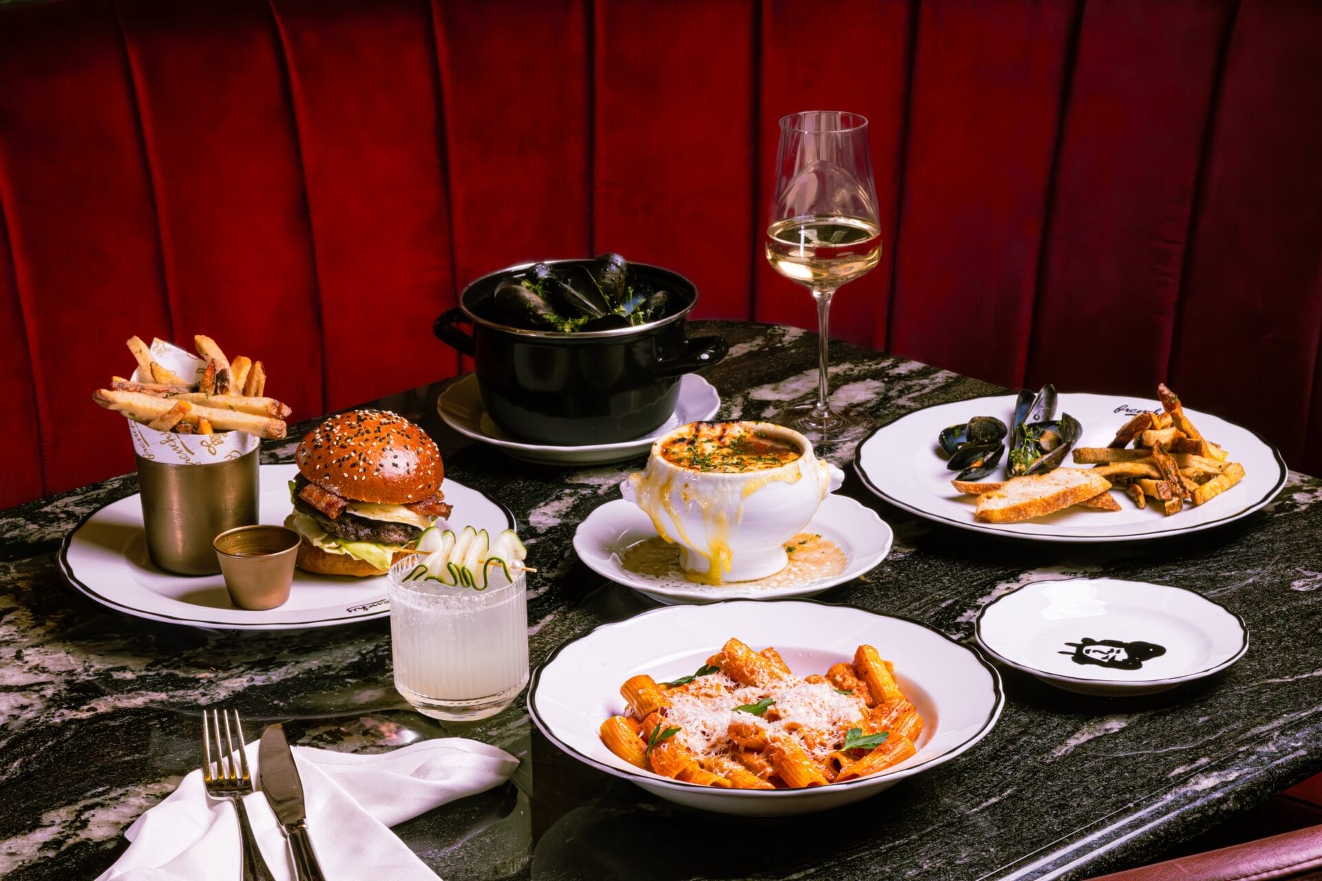 A french inspired feast including Burgers, Steamed Mussels, Onion Soup and Pasta.