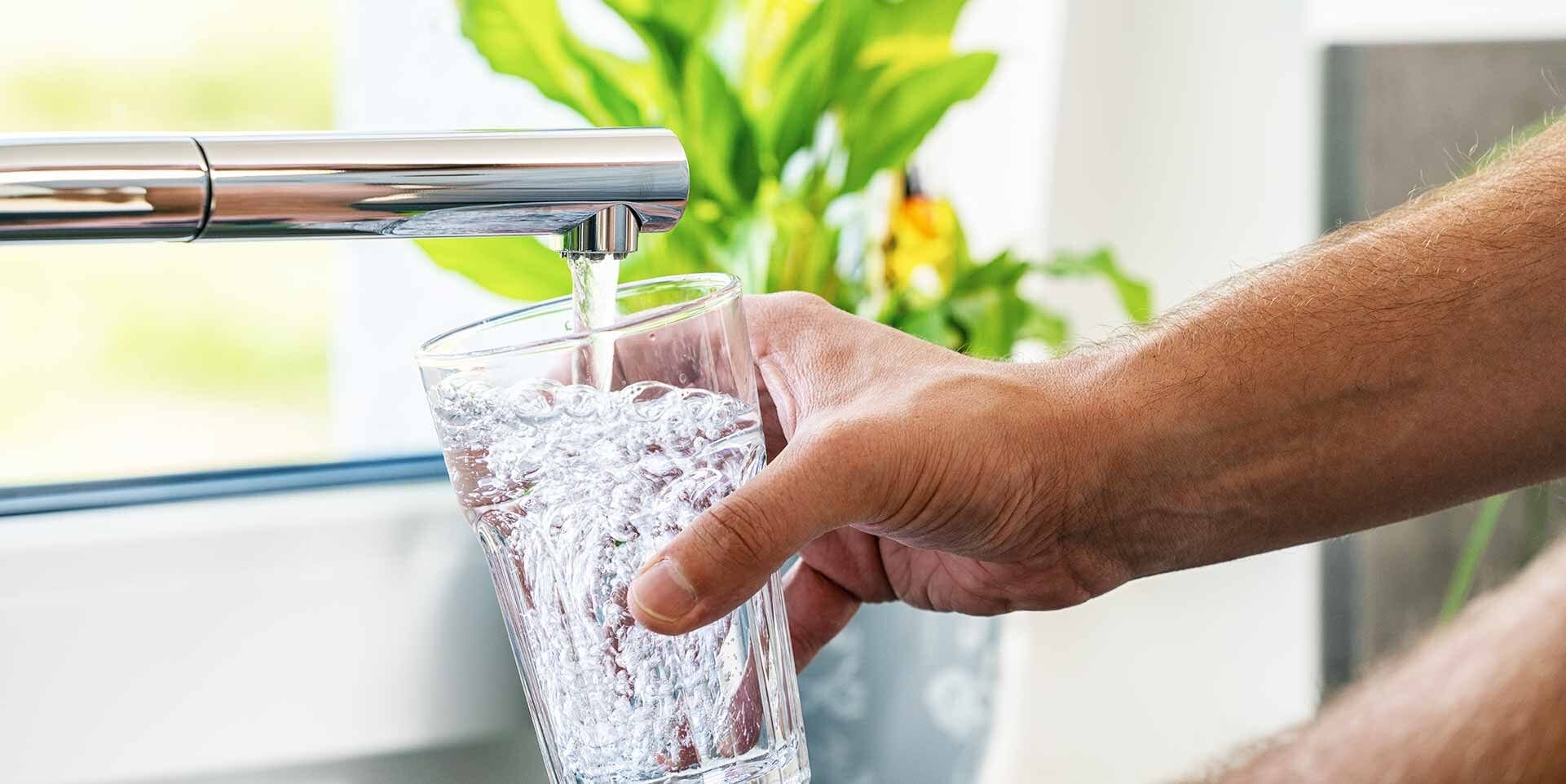 Pouring tap water in clear glass | Save Money