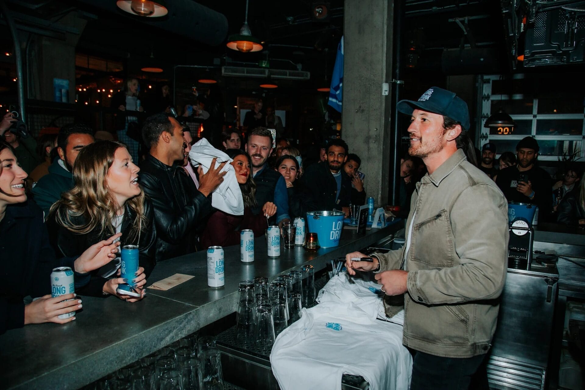 Miles Teller at his beverage brand's launch bar crawl