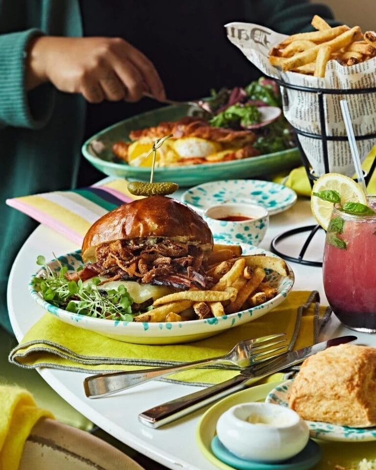 Family-friendly restaurant with a table spread. Image by Mildred's Temple Kitchen.
