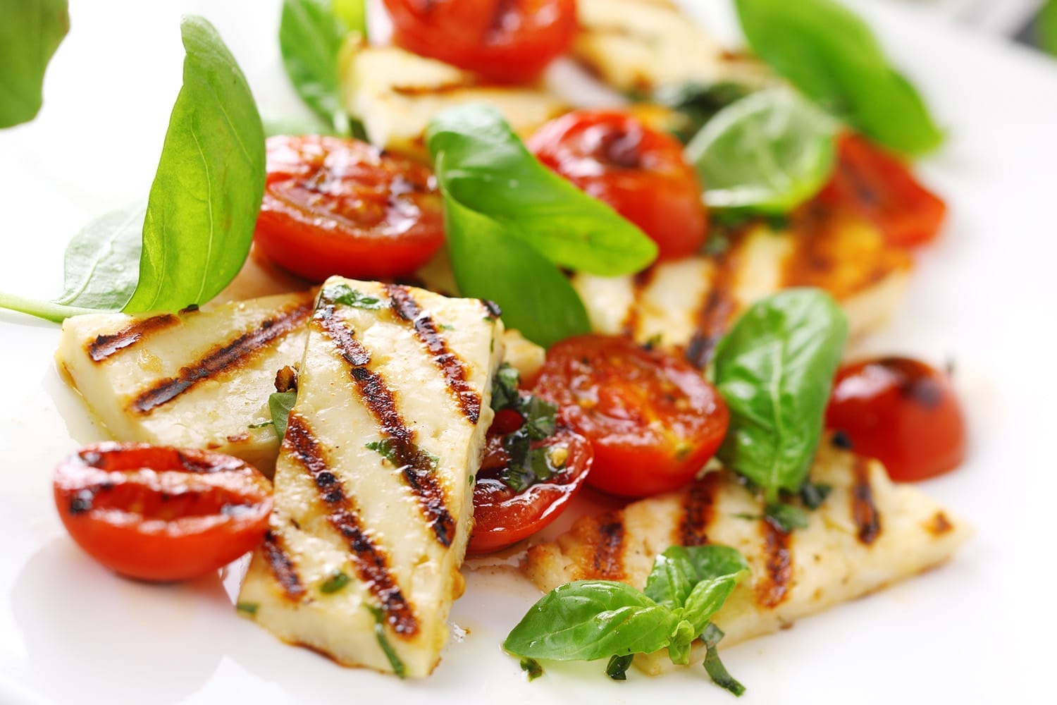 Salad of cheese, tomato, and herbs