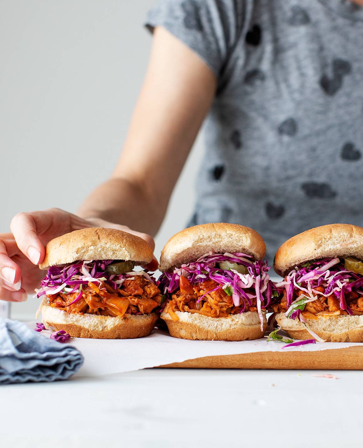 Slider burgers with BBQ pulled pork and cabbage