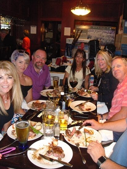 people gathered and having food at the restaurant