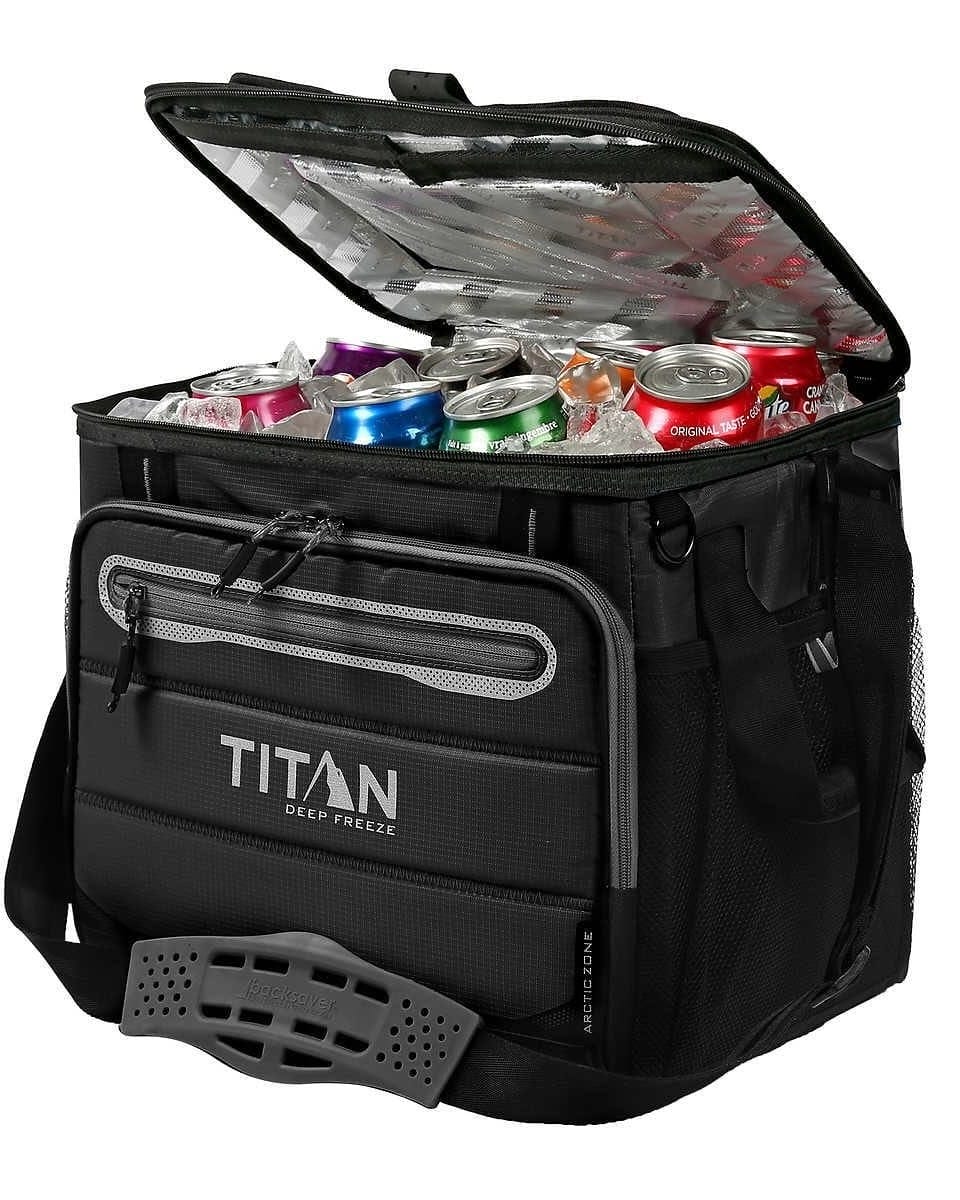 A black Titan Deep Freeze soft cooler bag with an open lid shows assorted canned drinks and ice packs inside.