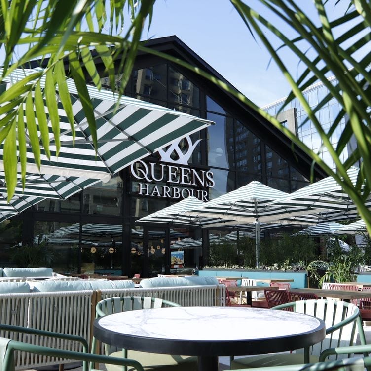 Queens Harbour waterfront patio restaurant in Toronto with outdoor seating and lakefront views