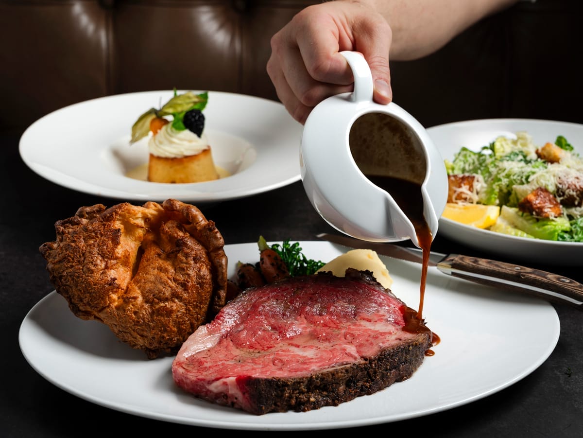 Prime rib dinner with Yorkshire pudding at Black+Blue steakhouse in Toronto
