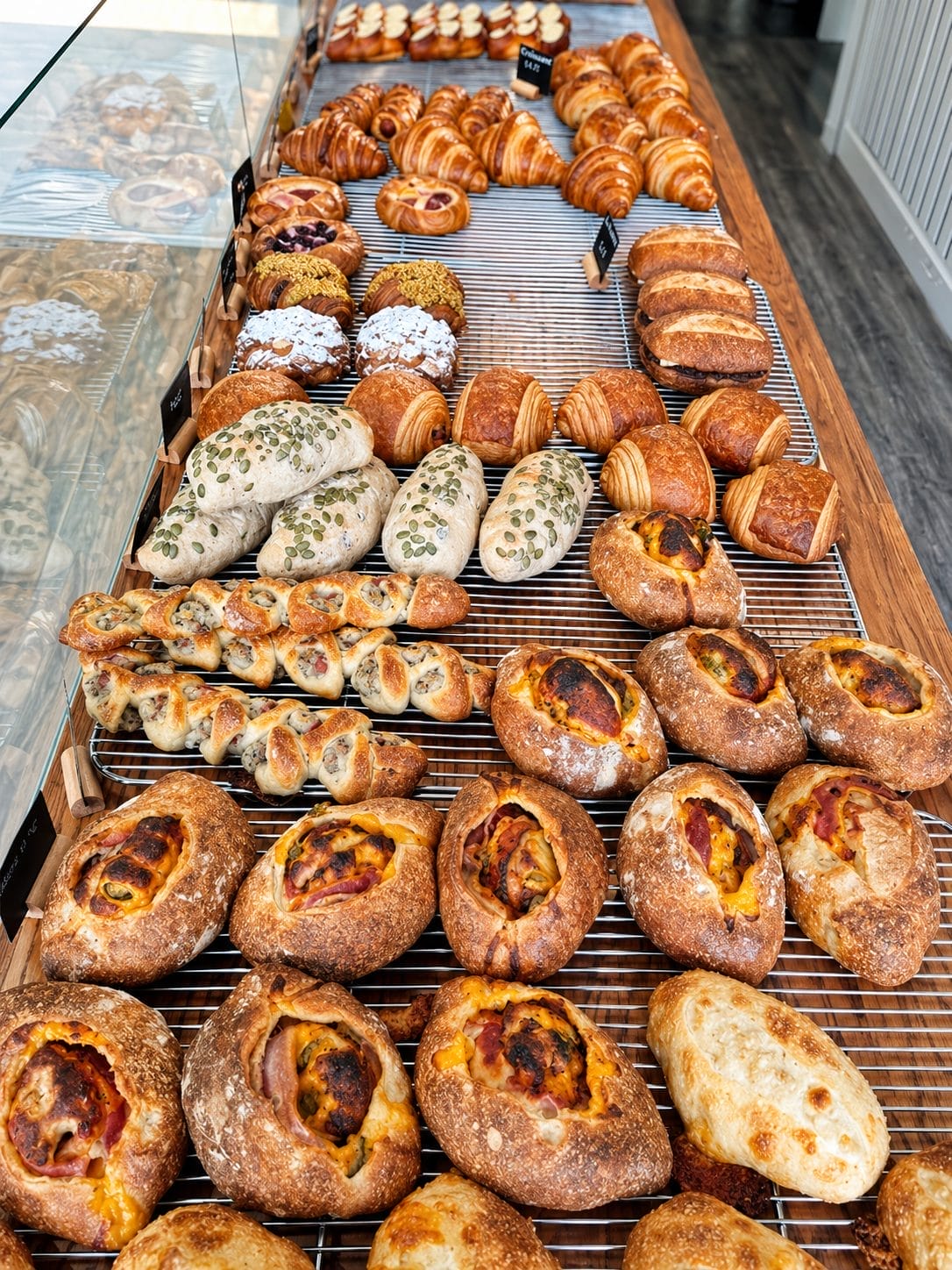 Fresh pastries, croissants, and savoury sourdough breads at Bricolage Bakery in Toronto