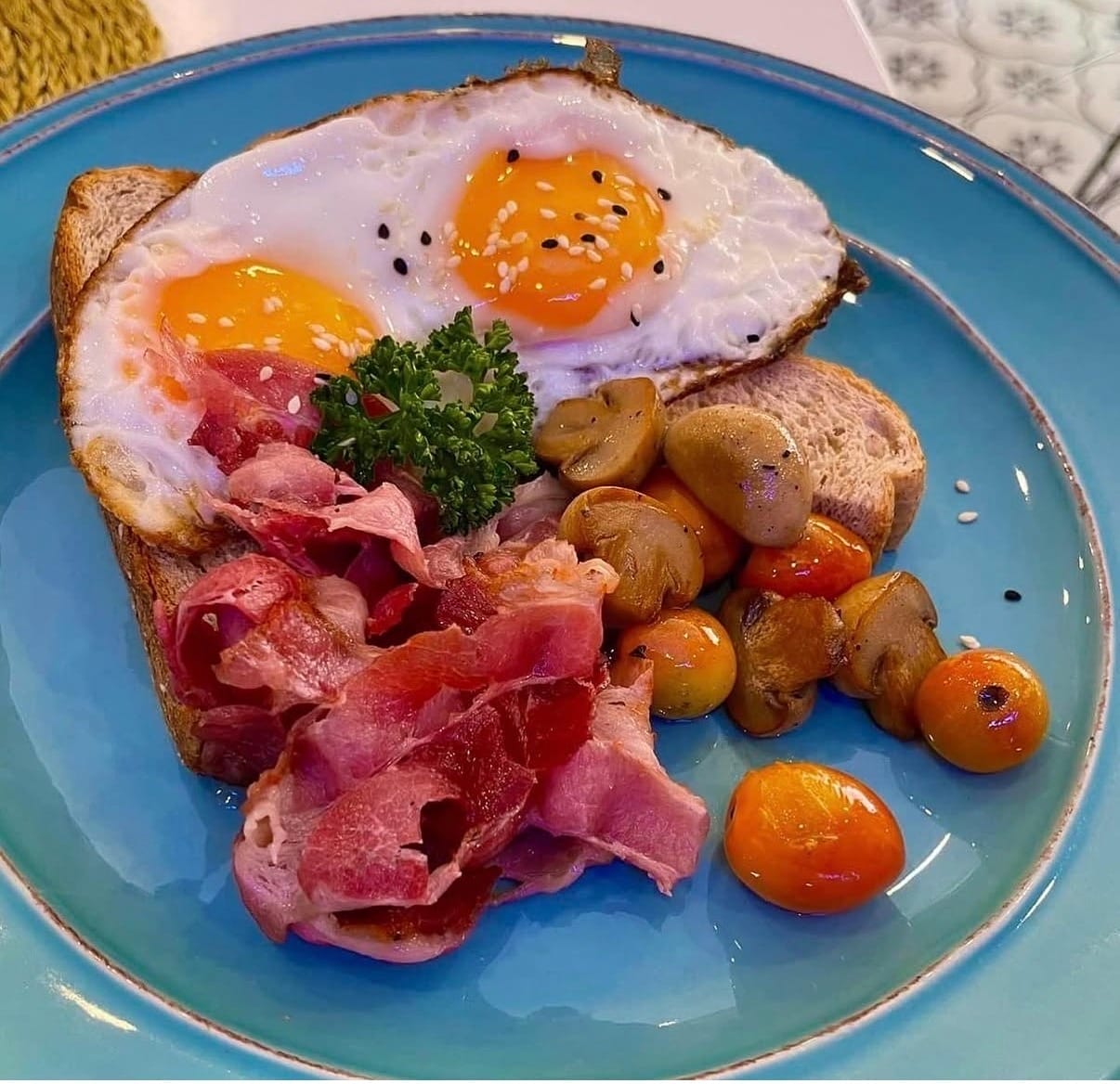 Perfect for breakfast eggs, bacon, mushroom, cherry tomatoes and bread.