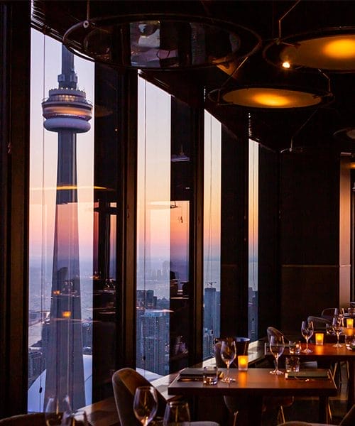 Canoe sits high in Toronto’s financial core, offering panoramic city and lake views through floor-to-ceiling windows.