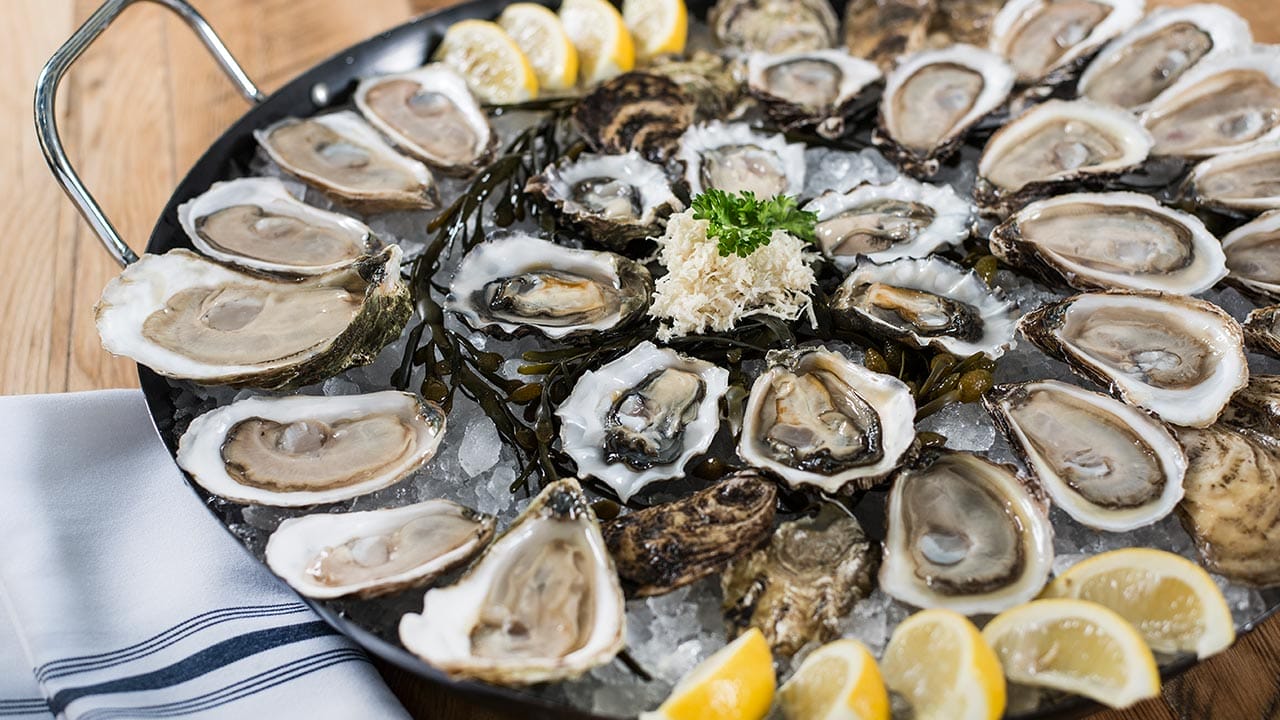 Fresh oyster platter with lemon at Rodney’s Oyster House in Toronto
